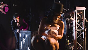 Rebecca the ventriloquist plays with the dummy's wood